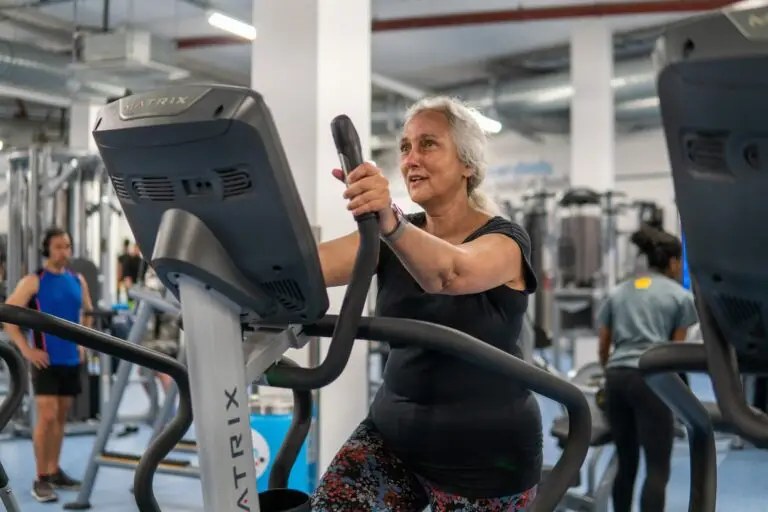 Older person using gym equipment