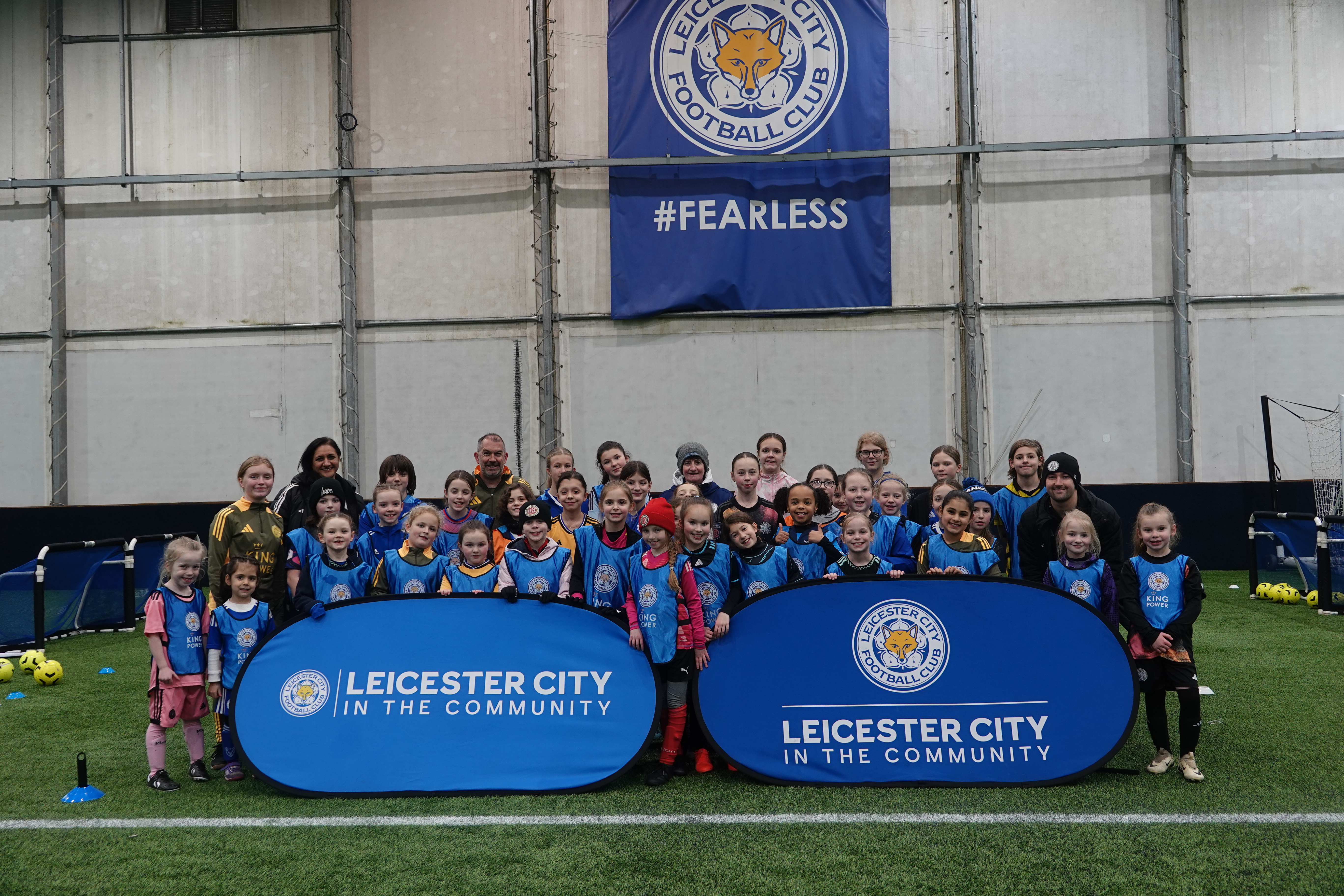LCFC in the community group photo with children