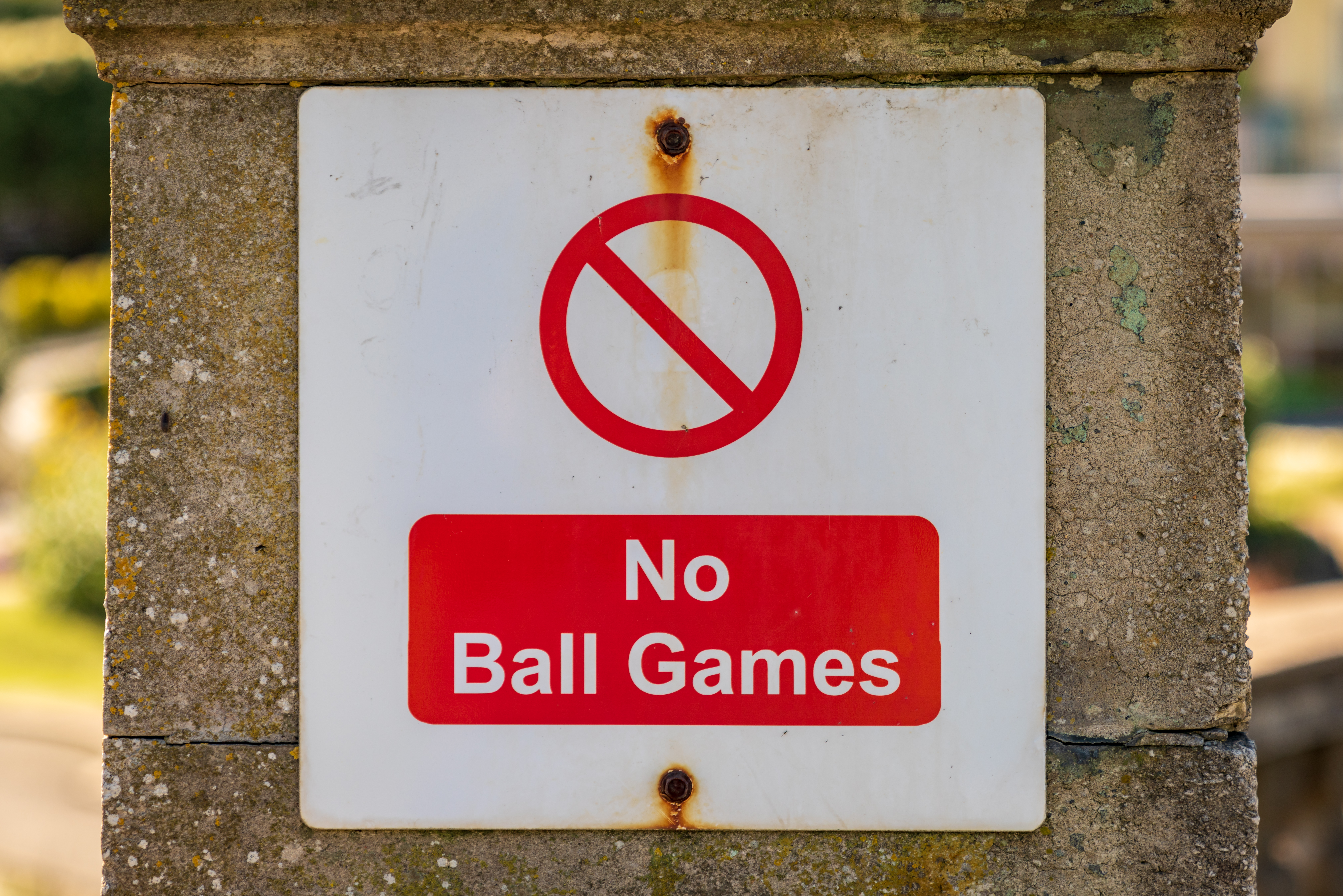 Sign on a wall stating No Ball Games